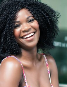 African American woman smiling with veneers in Inglewood